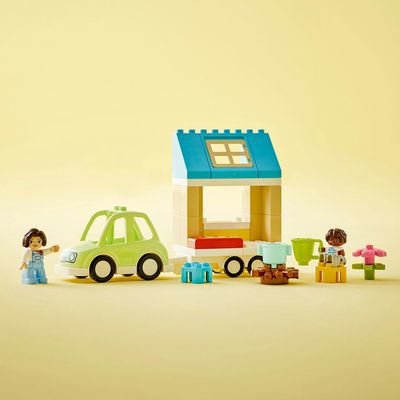 Магазин обуви Конструктор LEGO DUPLO Семейный дом на колесах 10986